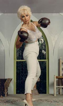 Buxom Blonde With White Lace Bra And Boxing Gloves