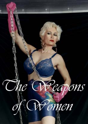 The Weapons of Women: Powerful Beautiful Blonde Woman Holding A Chain in skin tight blue shorts, pink opera gloves and blue double D bra
